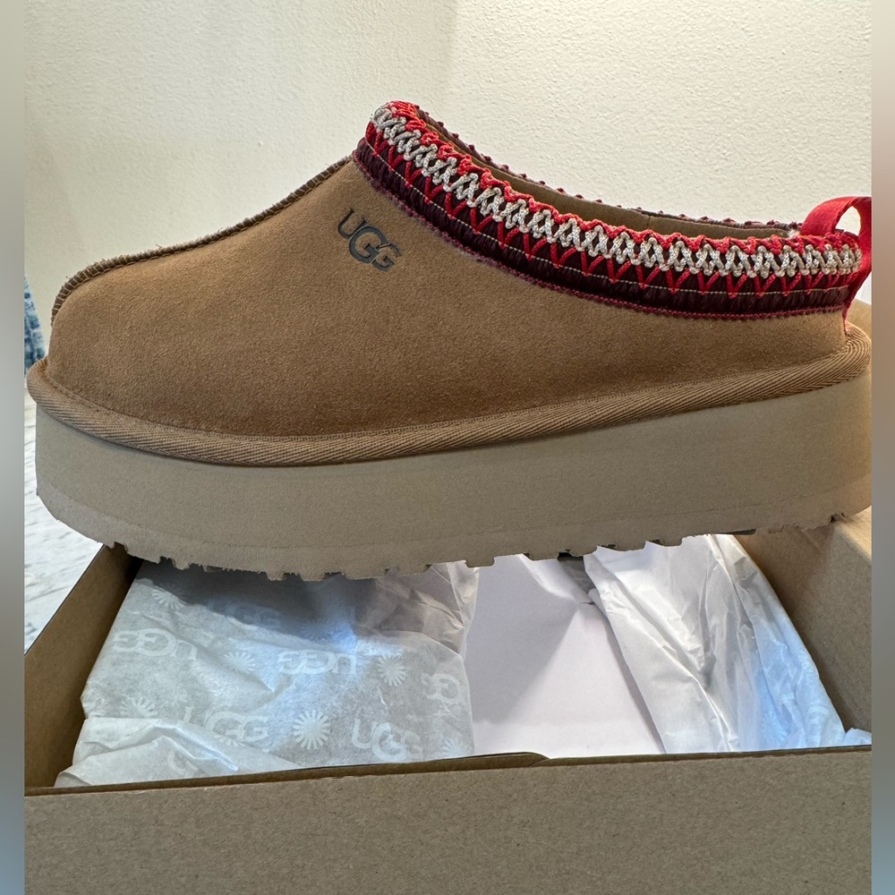 New in box Ugg size 6